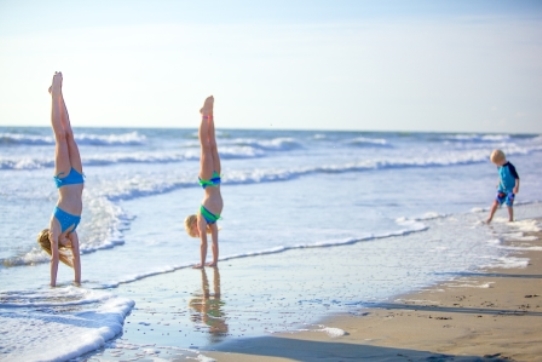 Hand Stands on Sanbridge Beach, Virginia beach Summer Fun